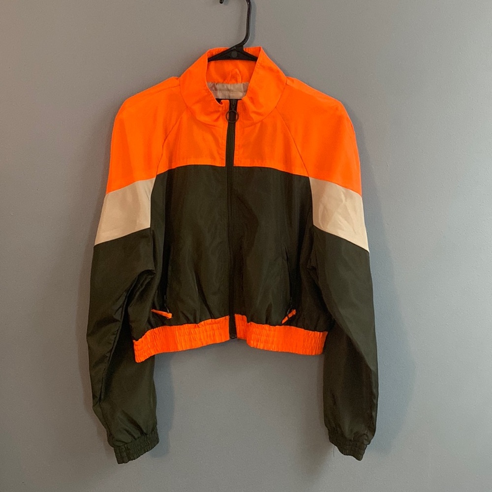 Colors on this jacket are cream, orange, and green, in a size Large from Rue21